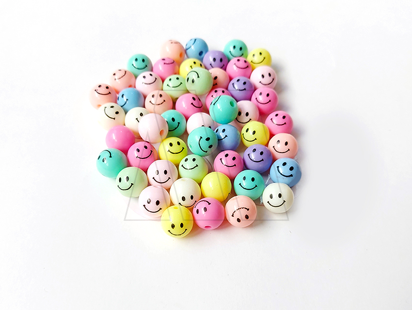 CUENTAS DE PLASTICO CARITA FELIZ REDONDA10MMX125G