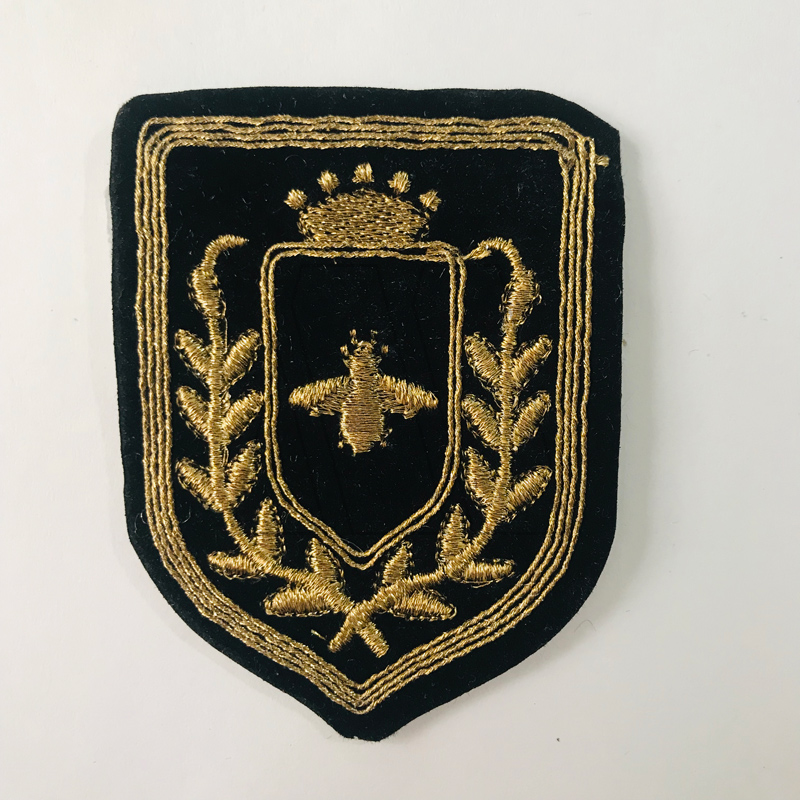 APLIQUE BORDADO TERCIOPELO ESCUDO MARCELO 75MM X 6UN