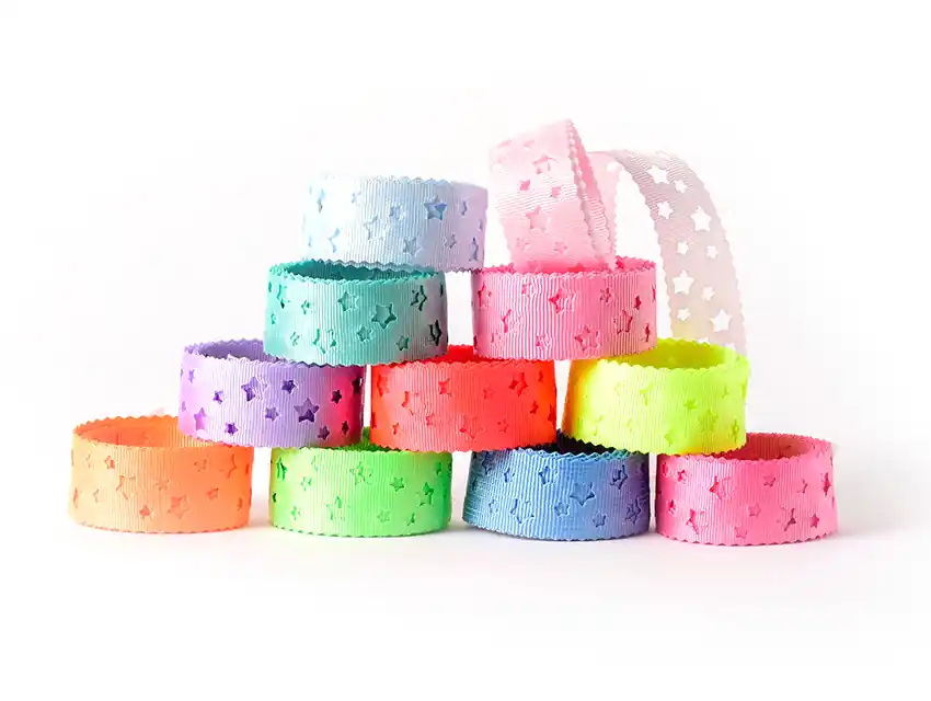 CINTA TROQUELADA ESTRELLAS CORDON DE ORO 23MM X 10MTS