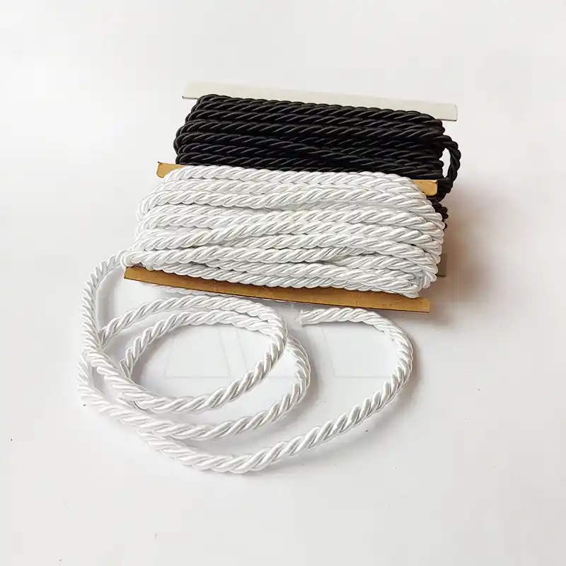 CORDON RAYON COMUNION TRENZADO BLANCO-NEGRO 8MM X 10MTS