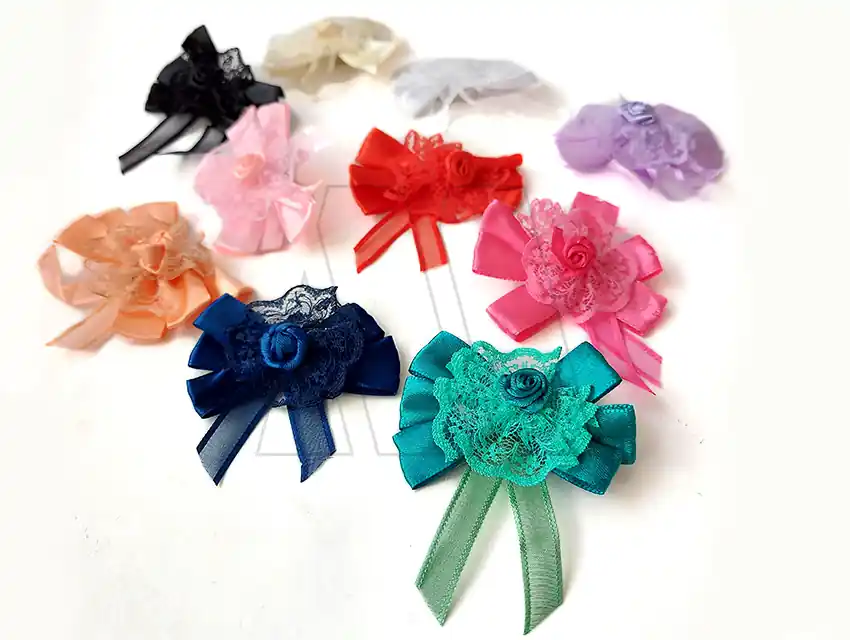 MOÑO PRENDEDOR COLOR 6CM X 4CM X 10UN