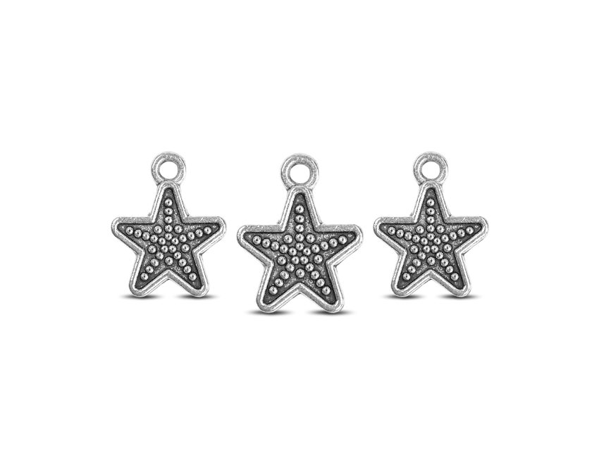 DIJE METALICO NIQUEL ESTRELLA 1CM X 50GRS 65UN APROX 