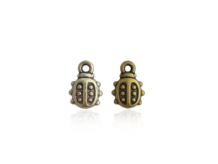 DIJE SIMIL METALICO VAQUITA SAN ANTONIO 9MM X 10MM X 50GRS 230UN APROX 