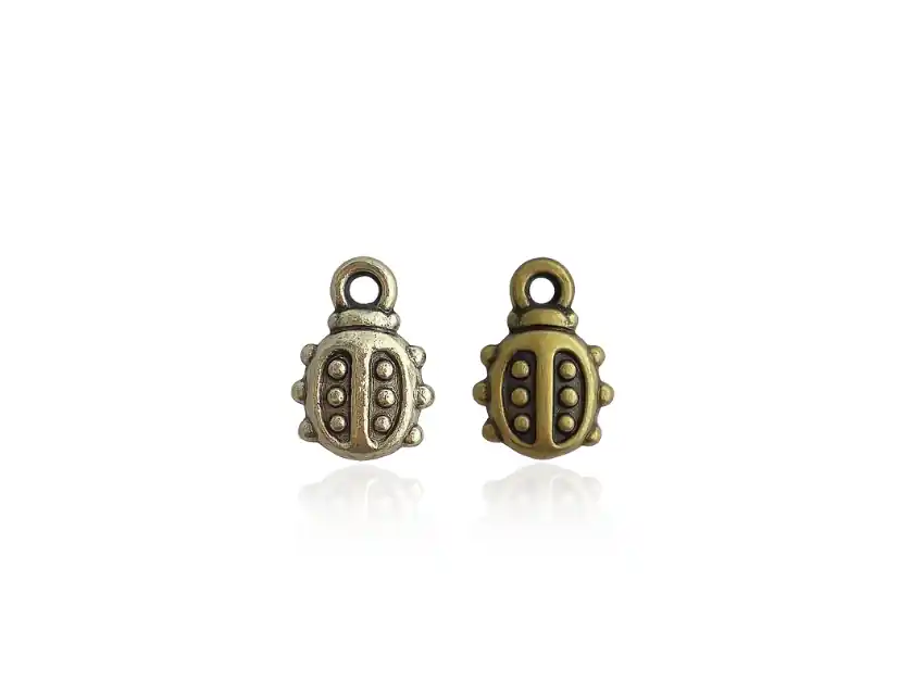 DIJE SIMIL METALICO VAQUITA SAN ANTONIO 9MM X 10MM X 50GRS 230UN APROX 