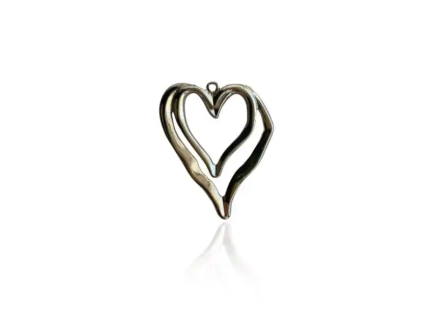 DIJE METALICO NIQUEL CORAZON DOBLE 5,5CM X 6,5CM X 125GRS 10UN APROX