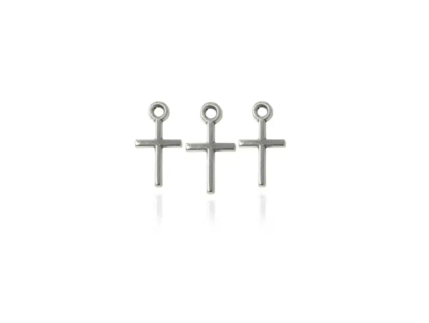 DIJE METALICO NIQUEL CRUZ 10MM X 18MM X 50GRS X 70UN APROX.