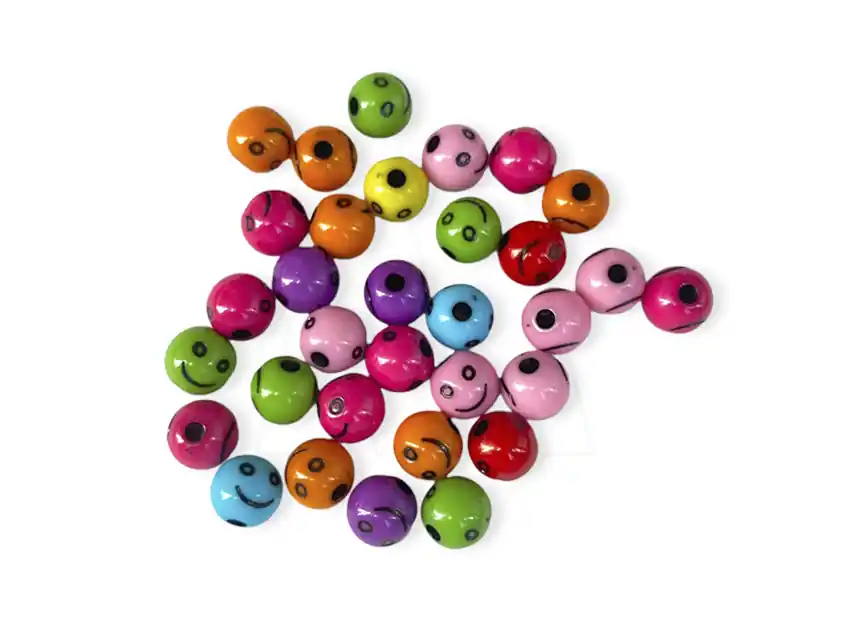 CUENTAS DE PLASTICO REDONDAS CARITAS FELICES 10MM X 125GR