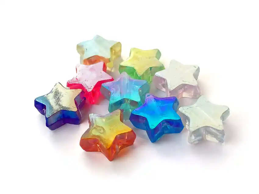  CUENTAS DE PLASTICO TORNASOLADAS ESTRELLAS 11MM X 125GRS 