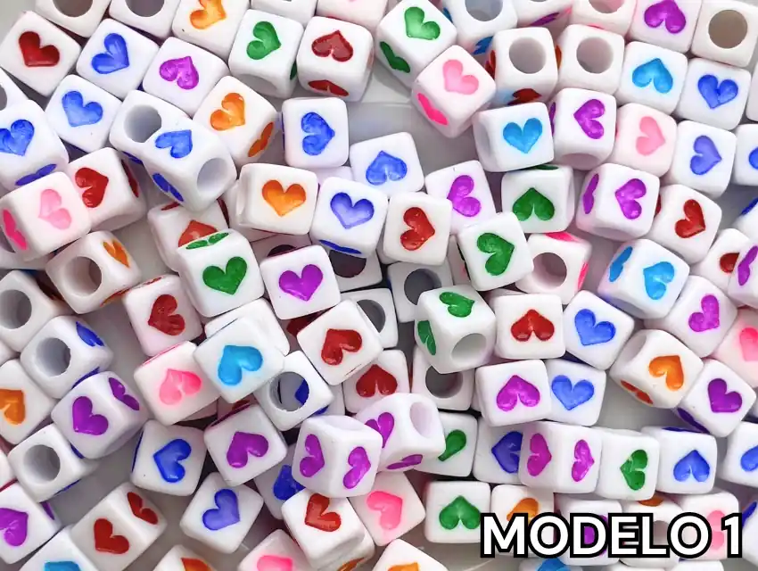 CUENTAS DE PLASTICO CORAZONES 6MM X 125GRS 