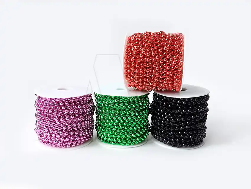 PERLAS METALIZADAS PEGADAS EN ROLLO NRO 6 X 20YDS